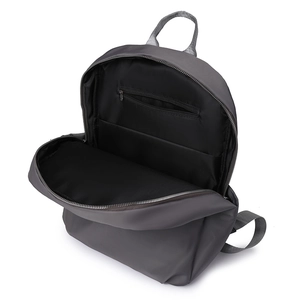 Internal view of gray backpack with spacious main compartment and zipper pocket