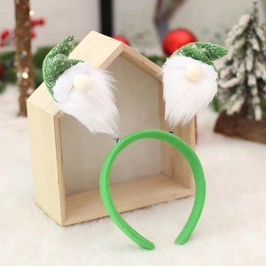 Serre-tête de Noël avec gnomes verts à paillettes et ressorts sur fond de fourrure