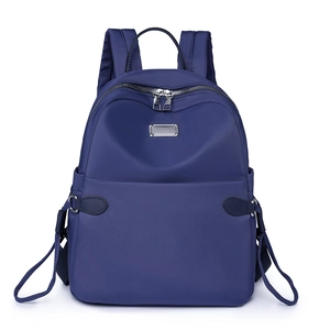 Wasserdichter dunkelblauer Oxford Rucksack mit silberner Plakette für Damen