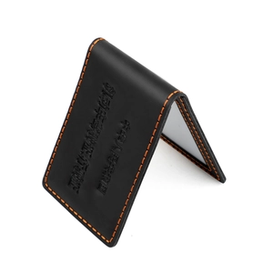Vintage black leather driving license holder with orange stitching and embossed text