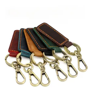 Detailed display of six vintage crazy horse leather car keychains in assorted colors