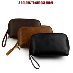 Three vintage leather tech pouches in dark coffee, brown, and black with wrist straps