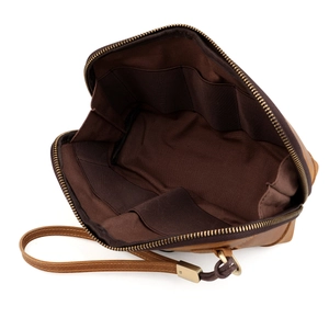 Macro view of vintage brown leather organizer with five internal elasticated pockets