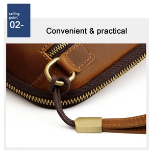 Macro detail of crazy horse leather bag with bronze zipper and braided wrist strap
