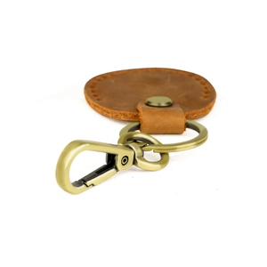 Vintage brown leather keychain with bronze spring hook and secure keyring for AirTag