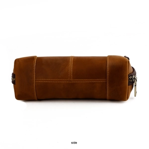 Side view of vintage brown crazy horse leather pouch with durable metal zipper details