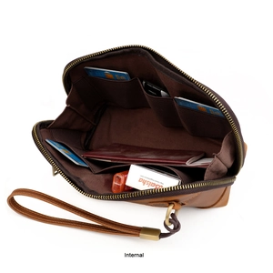 Detailed view of brown crazy horse leather clutch with card slots and wrist strap