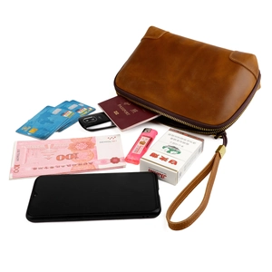 Vintage brown crazy horse leather clutch bag for phone and cards with wrist strap