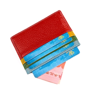 Close-up of colorful leather card holder with multi-slot design and lychee texture