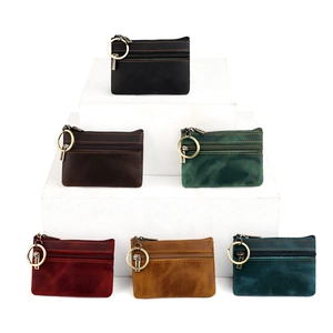 Detailed collection of vintage genuine leather coin purses with antique metal rings