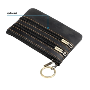 Detail view of black crazy horse leather coin purse with triple zippers and orange stitching