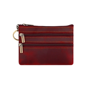 Close-up of wine red crazy horse leather coin purse with triple zippers and brass keychain