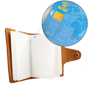 Detail view of vintage crazy horse leather card holder with snap button and card slots