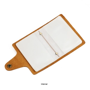 Detailed interior of vintage crazy horse leather card holder with clear plastic slots