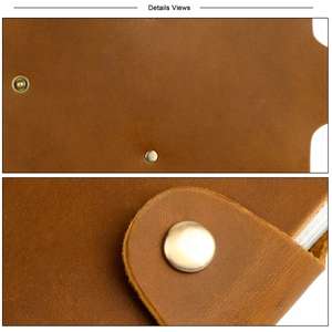 Detailed macro view of vintage brown leather card holder with secure gold metal snap button