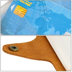 Close-up of vintage leather card holder featuring transparent PVC slot and star metal snap