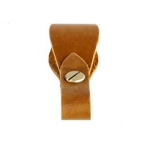 Close-up of brown crazy horse leather strap with brass screw bolt for outdoor keychains