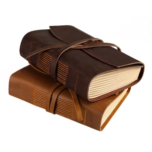 Handmade crazy horse leather vintage journal with strap closure and stitched binding