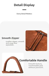 Detail of soft brown PU leather backpack featuring smooth dual zippers and a round handle