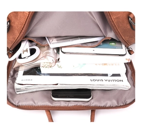 Interior view of large brown backpack showing spacious main compartment and lining
