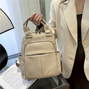 Fashionable beige faux leather backpack for women with multi-zipper pockets for casual travel
