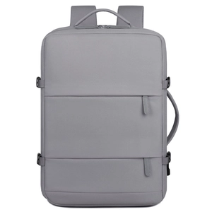 Detail view of water-resistant gray travel backpack with multiple compartments and buckles