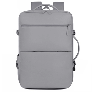 Detail view of the light grey travel backpack showing side handle and buckle straps