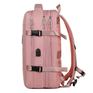 Side view of waterproof nylon travel backpack with USB port and multiple zipper layers