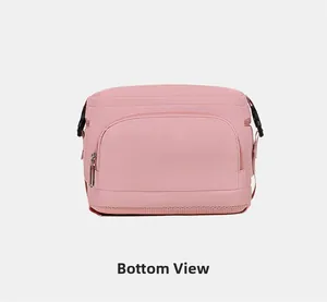 Bottom view of pink laptop backpack featuring breathable mesh and durable plastic buckle
