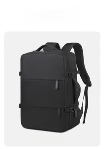 Detail of travel backpack showing reinforced handles, side buckles, and durable nylon fabric