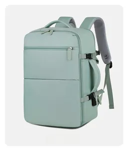 Detail of mint green travel backpack with side handle, buckles and breathable straps