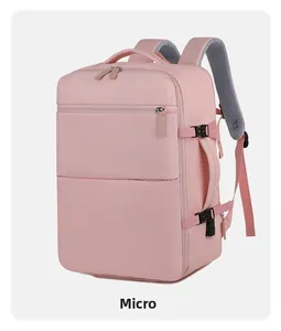 Detail view of pink multifunctional travel backpack with side handle and buckle straps