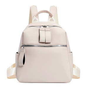 Minimalist cream white PU leather backpack for women with pebbled texture and silver zippers