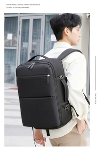 Close-up of lightweight black business travel backpack featuring side buckle and padded straps