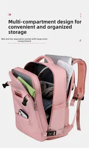 Pink travel backpack showing 180-degree opening and large capacity compartments
