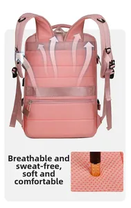 Ergonomic breathable mesh back panel of the pink travel backpack with luggage strap