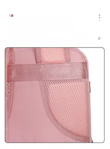 Macro detail of breathable 3D mesh back panel and trolley strap on pink travel backpack