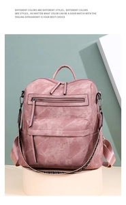 Detailed view of a pink PU leather backpack featuring dual zippers and floral fabric straps