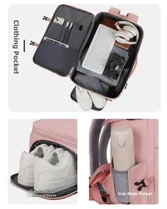 Detail view of pink travel backpack featuring independent shoe compartment and side mesh pocket