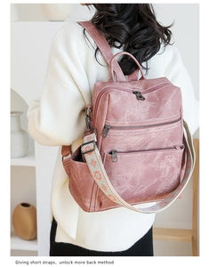 Zaino vintage rosa con tracolla ricamata floreale e tasche multiple con cerniera