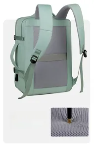 Detail of mint green travel backpack with breathable mesh padding and charging port