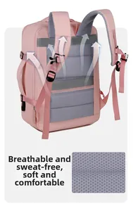 Detail of pink travel backpack featuring breathable mesh back and padded shoulder straps