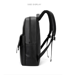 Vue latérale d'un sac à dos d'affaires noir en cuir avec bretelles en mesh respirant