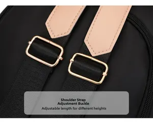 Detail of adjustable nylon shoulder strap with gold metal buckle and leather patch