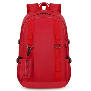 Detailed view of red hiking backpack featuring durable fabric and side buckle adjustments