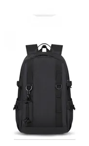 Front detail of black hiking backpack with modular D-rings and detachable small pouch