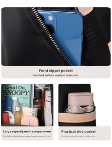 Detail of black nylon backpack featuring large main compartment and side pocket storage
