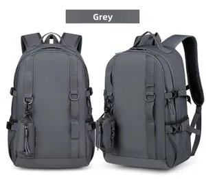 Detail view of the grey water-resistant backpack with attached small modular accessory pouch