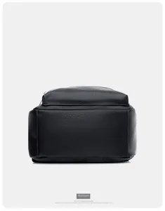 Detailed bottom view of black litchi pattern PU leather backpack with smooth texture