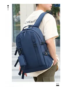 Side view of a large capacity navy hiking backpack with side pouch and adjustable buckles
